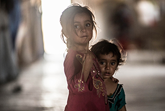 In Sharuja Polaq, een klein dorpje in Irak, worden sinds enkele jaren 170 families opgevangen die op de vlucht zijn voor IS. Elke familie bestaat gemiddeld uit 8 mensen. Voor 2014 bestond het dorpje uit ongeveer 40 families. Foto's: Sam Cunningham/Oxfam