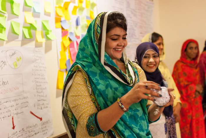 Pakistani youth attending a workshop.