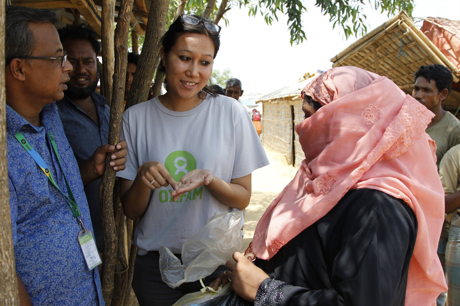 180430_Oxfam EFSVL Team Lead Shreeju speaks to Rohingya woman Moriam_ about fresh food voucher program in Ukhia mega-camp.JPG