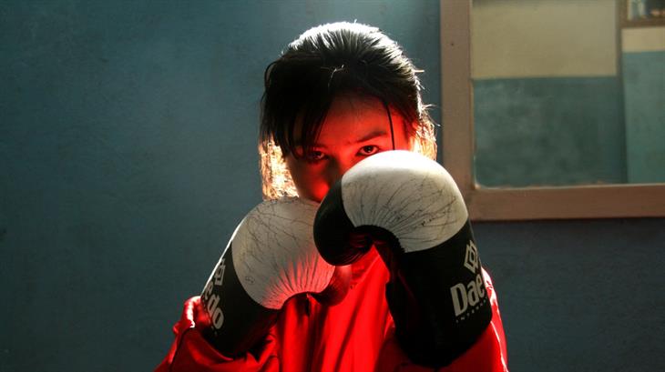 A girl training in the gym at The National Stadium in Kabul.